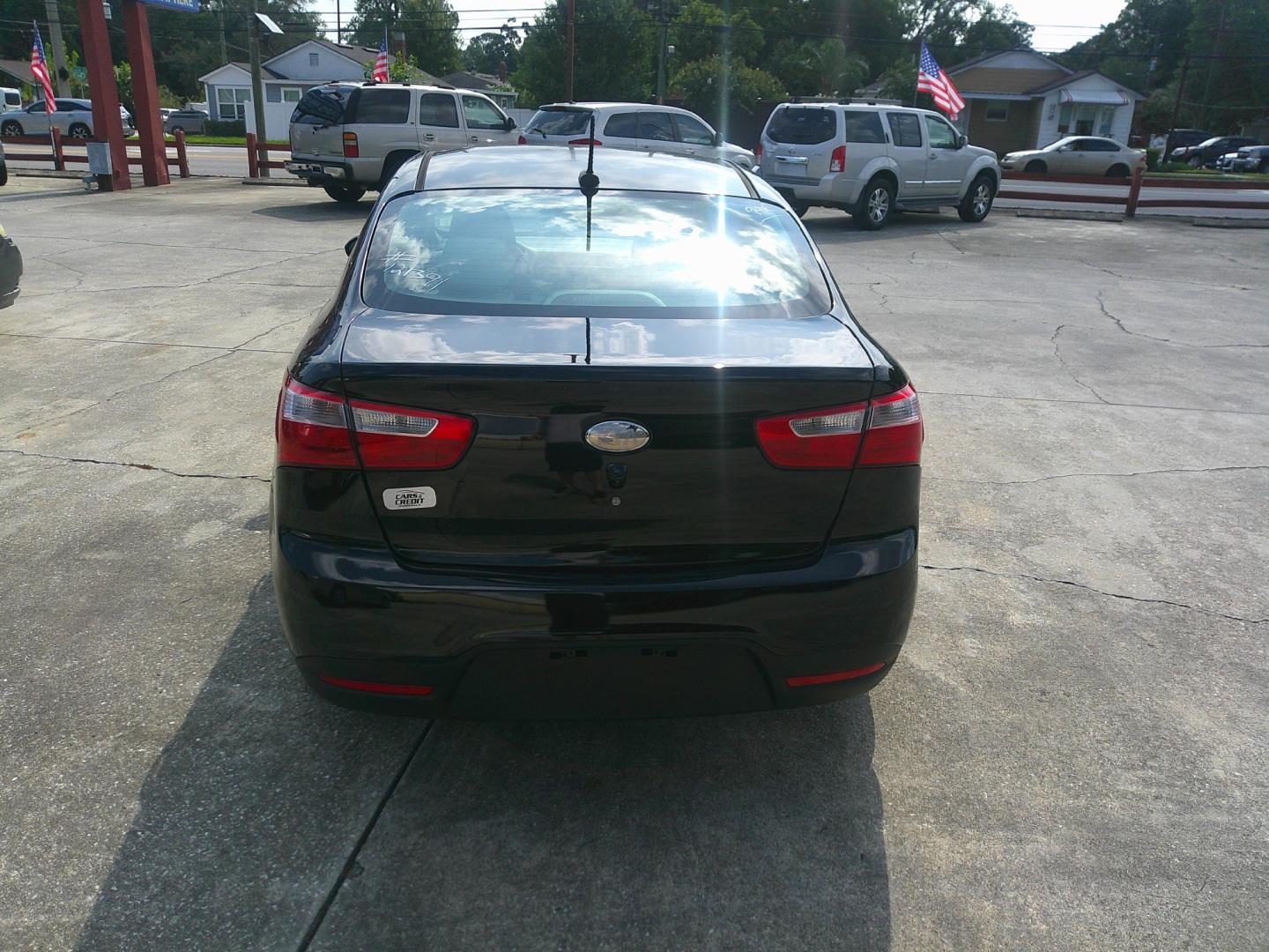 2013 BLACK KIA RIO EX; SX (KNADN4A3XD6) , located at 1200 Cassat Avenue, Jacksonville, FL, 32205, (904) 695-1885, 30.302404, -81.731033 - Photo#3